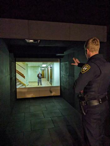 An Acton police officer participates in training inside the Middlesex Sheriff's Office Mobile Training Center.