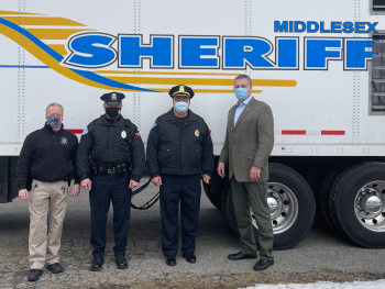 Middlesex Sheriff’s Office Officer Edward Welch (from left to right), Billerica Police Patrolman Rich Avant, Police Billerica Police Chief Daniel Rosa and Middlesex Sheriff Peter J. Koutoujian during a visit to the Mobile Training Center.  Photo courtesy of the Middlesex Sheriff’s Office