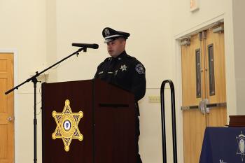 President Brendan Shea addresses classmates during the recent graduation ceremony for members of the Middlesex Sheriff’s Office 44th Basic Training Academy.