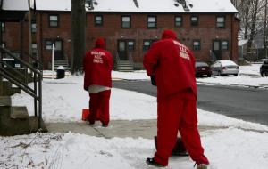 Inmates clear snow at Arlington Housing Authority properties