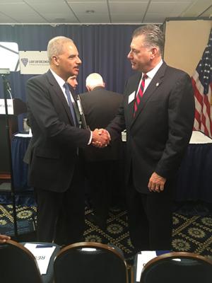 Former Attorney General Eric Holder and Sheriff Koutoujian