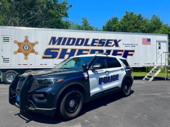 A Maynard Police cruiser parked outside the Middlesex Sheriff's Office Mobile Training Center.