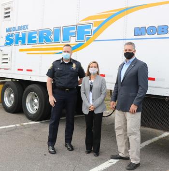 Medford Police Chief Jack Buckley (from left), Medford Mayor Breanna Lungo-Koehn and Middlesex Sheriff Peter J. Koutoujian visited the Mobile Training Center (MTC) on Tuesday, September 22, 2020.