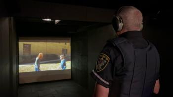 A Winchester police officer goes through scenario-based training in the Middlesex Sheriff's Office Mobile Training Center (MTC).
